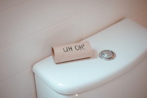 Overflowing toilet and water damage