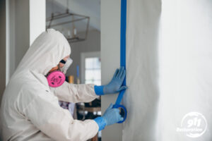 911Restoration-of-Peabody-mold-removal-taping-down